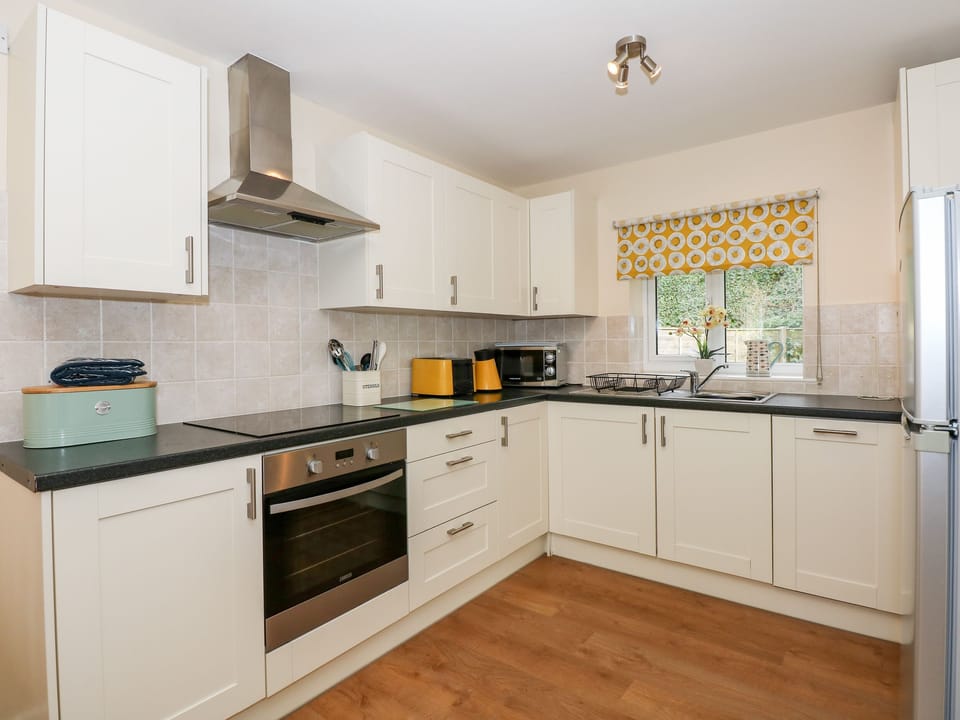 Fridge, dishwasher, cookware/dishes/utensils