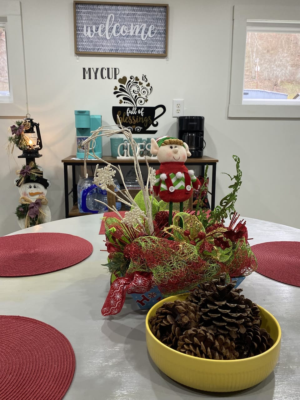 Coffee bar area with coffee, donuts & snacks