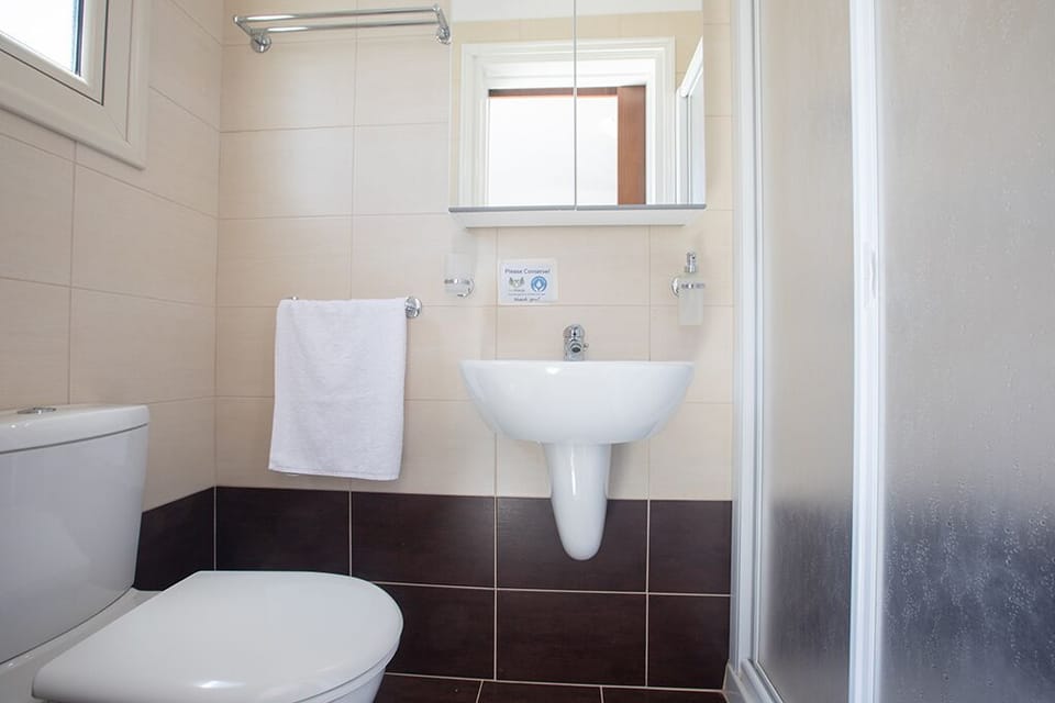 En Suite bathroom with shower and WC