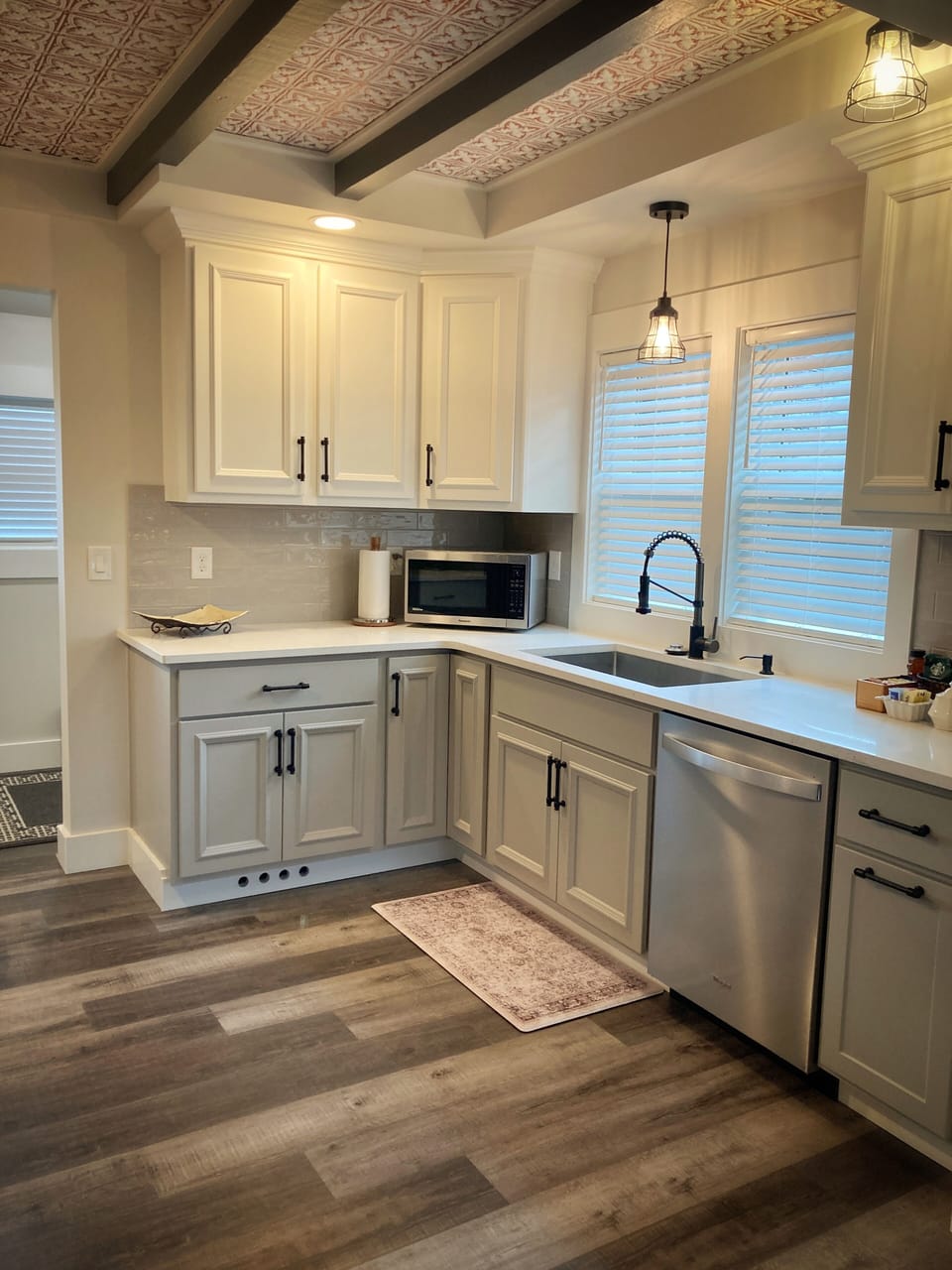Enjoy quartz counters & SS appliances in this thoughtfully renovated kitchen.