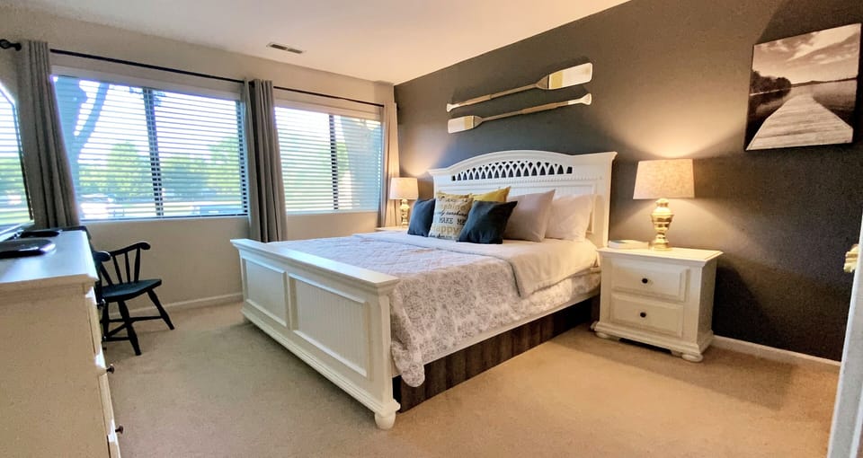 King-sized bed in the master with a 42" smart TV.