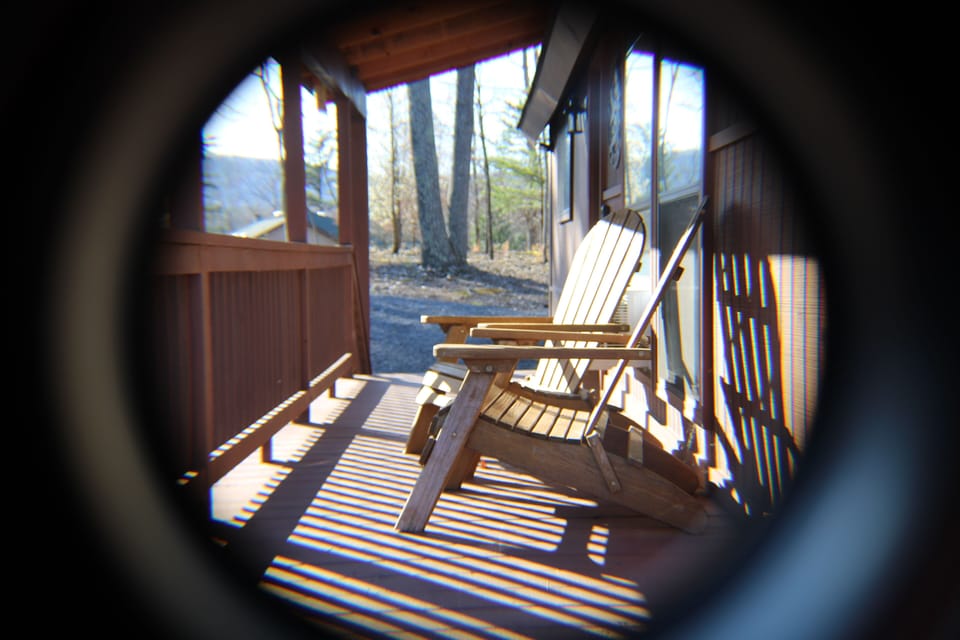 Captivating moments unfold: Sunset views on the enchanting side of  the cabin.