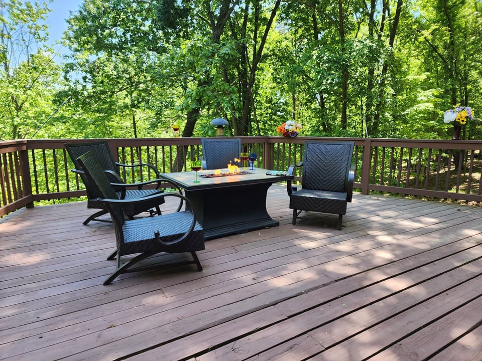  A symphony of fire wine and blissful relaxation on the retreat's inviting  deck
