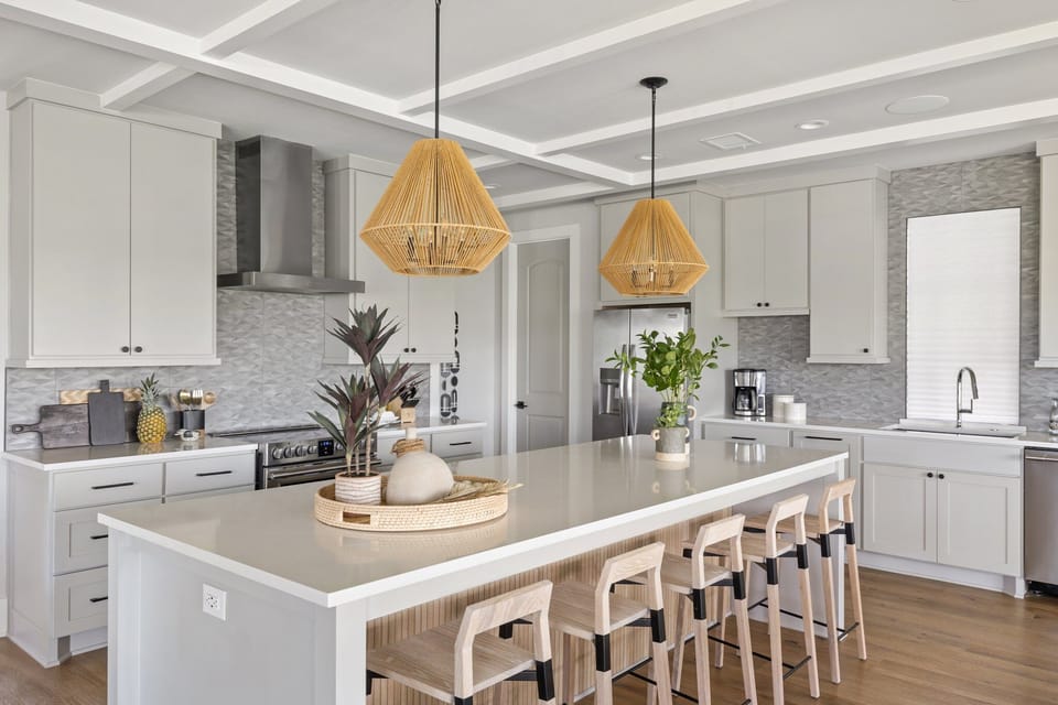 The well-appointed kitchen is spacious, bright and fully stocked.