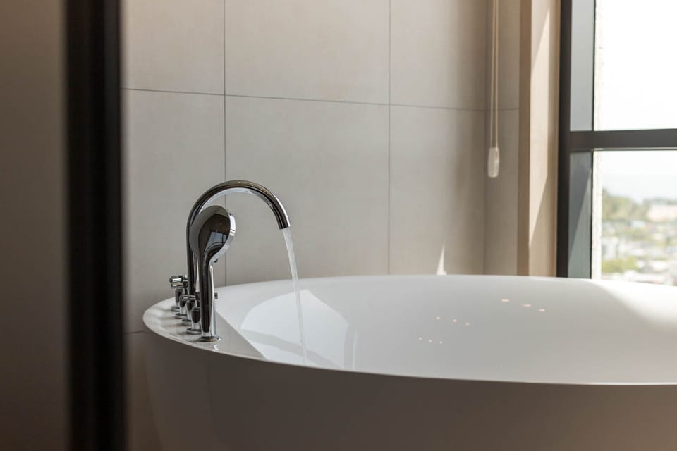 Signature Suite, 2 Double Beds, Sea View | Bathroom | Free toiletries, hair dryer, bathrobes, slippers