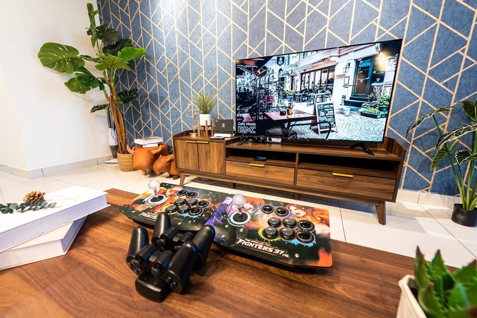Luxury Condo | Living area | 50-inch Smart TV with digital channels, video-game console