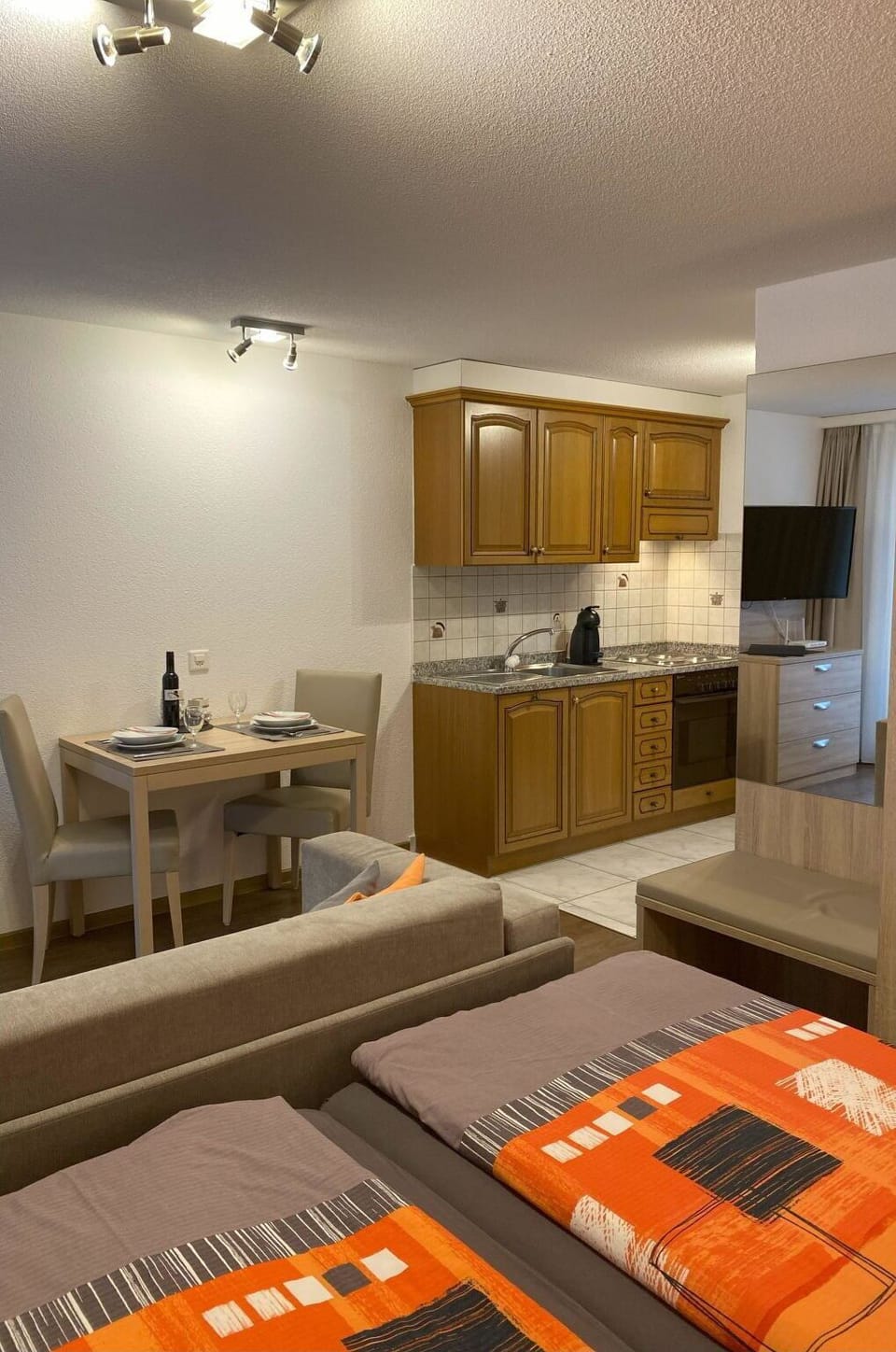 Cabinetry, Property, Furniture, Table, Countertop, Wood, Drawer, Interior Design, Lighting, Chair