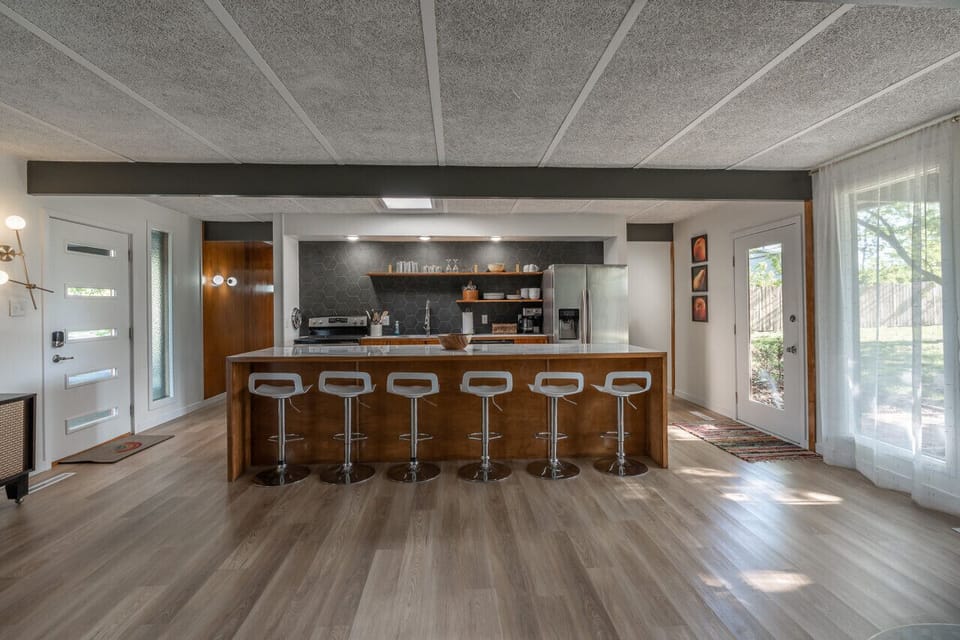 Ample seating in the open floor plan kitchen