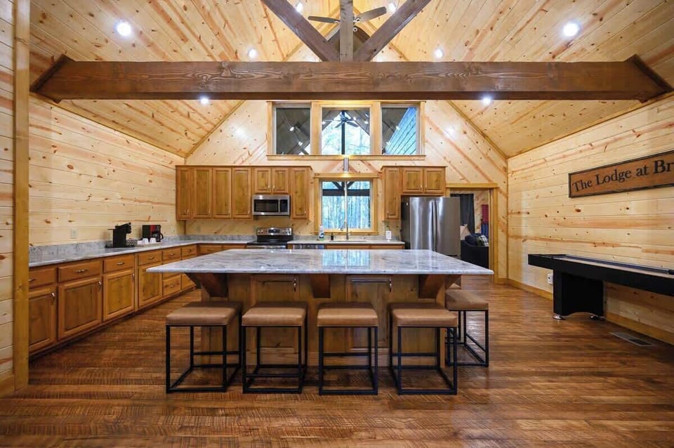 A massive open kitchen has everything ready at your fingertips to prepare meals during your stay at The Lodge by Boutiq.
| The Lodge by Boutiq Luxury Vacation Rentals | Broken Bow, Oklahoma