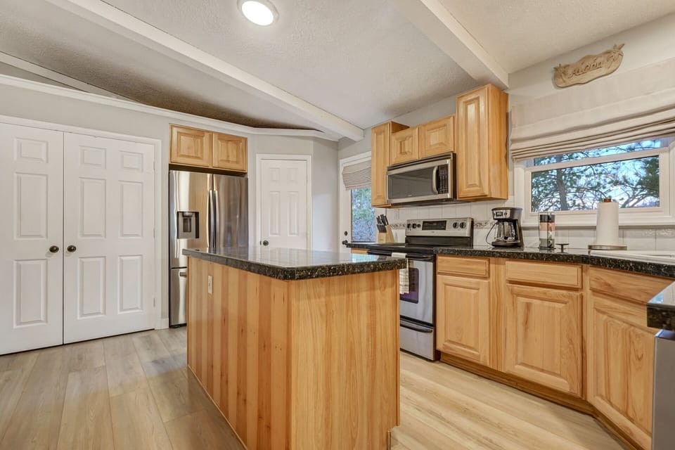 The laundry area is contained behind the double doors.