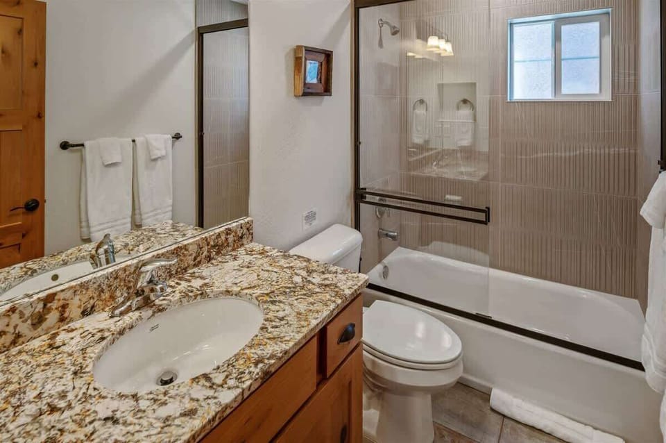 Main level full bathroom, with tub/shower combo