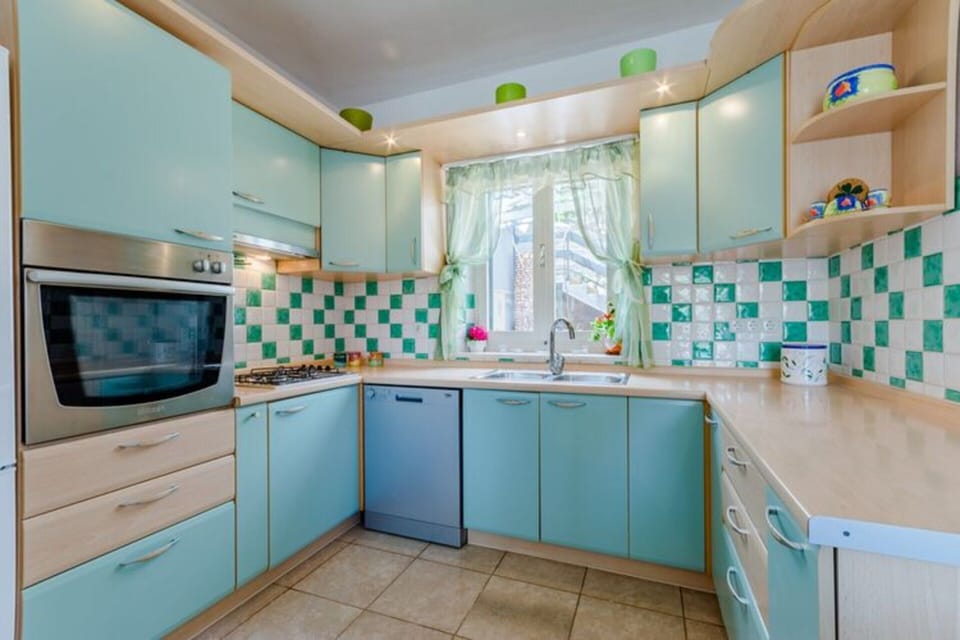 Villa | Private kitchen | Fridge, microwave, oven, stovetop