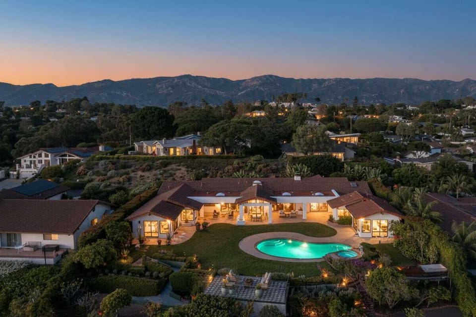 Single-story estate with classic tile roof and expansive frontage