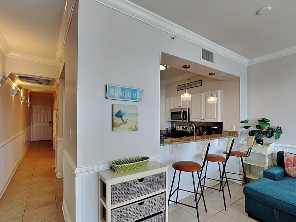 Fully Equipped Kitchen with Bar Seating for Three