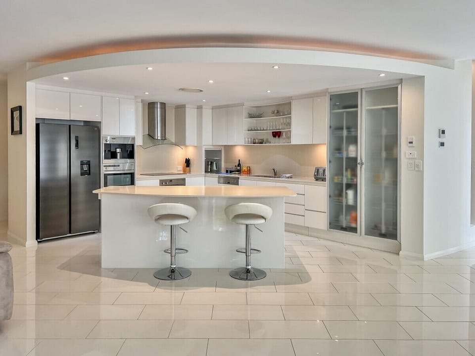 The fully equipped kitchen includes a Meile in built coffee machine with coffee beans.
