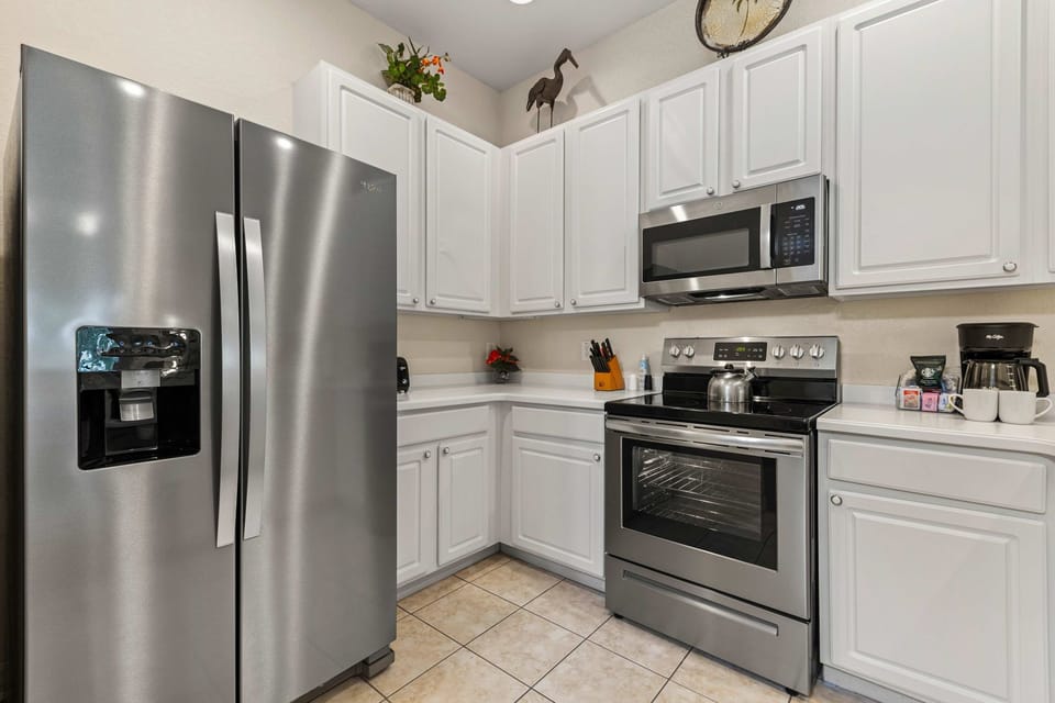Whip up your favorites with ease in this spacious, fully stocked kitchen