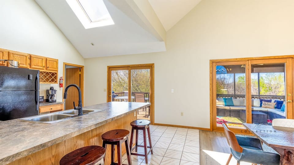 Kitchen stocked with all of the essentials -- additional seating at the breakfast bar