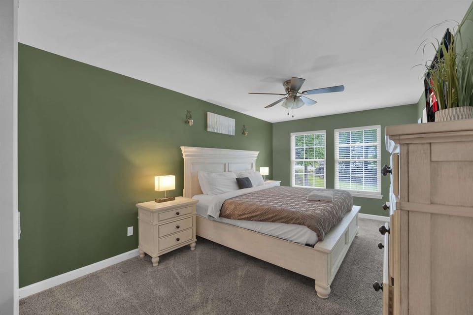 King Bedroom with Smart TV & Dresser