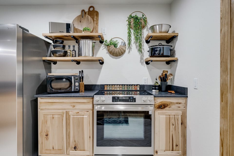 ELECTRIC STOVE/OVEN | REFRIGERATOR | MICROWAVE |  KEURIG W/ LIMITED KCUPS, SUGAR, HONEY