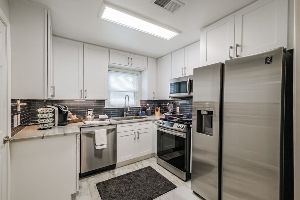 Kitchen with extra amenities:

Coffee maker, blender, microwave, toaster, flatware, dishes, drink glasses, mugs, pots, pans, cutting board, cooking utensils, dish soap, paper towels, cleaning products, oil, sugar, spices, tea, coffee, first aid...