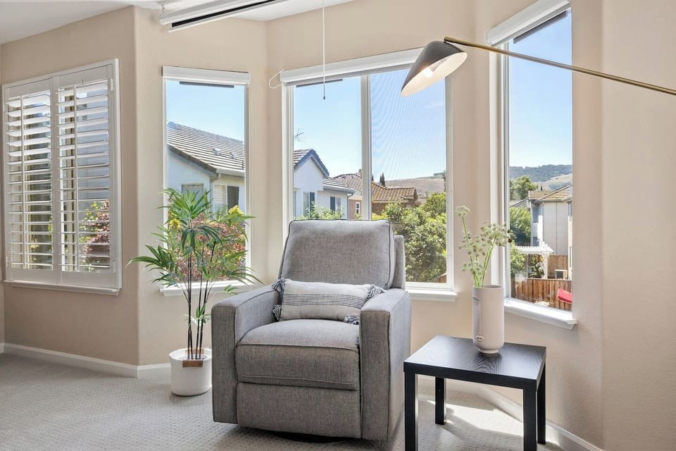 comfortable chair  in masters bedroom