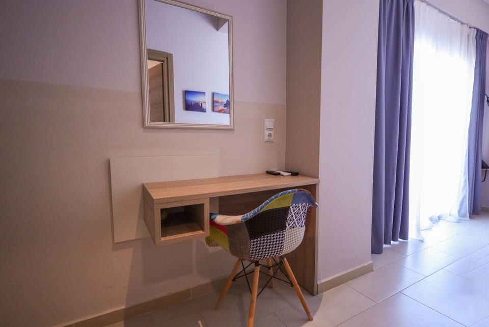 Standard Room with Garden View | Desk, blackout drapes, soundproofing, free WiFi