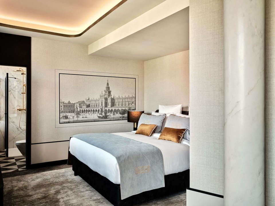 Suite, 1 King Bed | In-room safe, desk, soundproofing, free cribs/infant beds