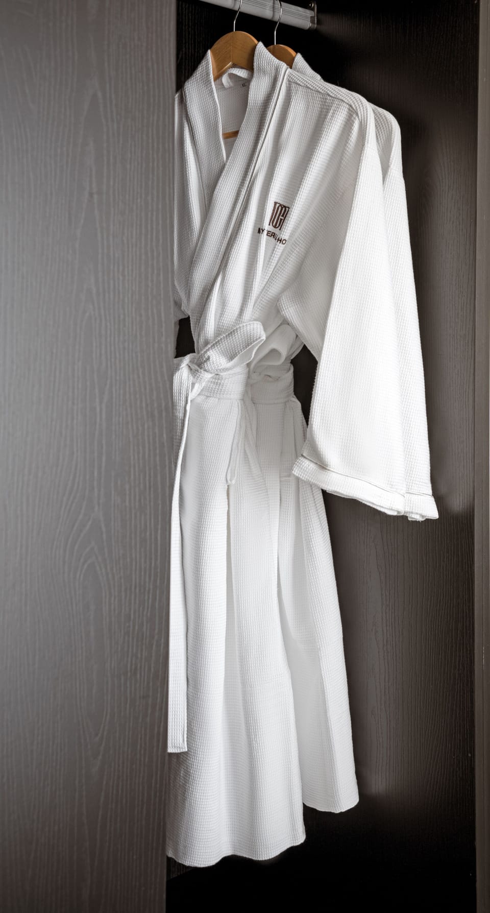 Designer toiletries, hair dryer, bathrobes, slippers