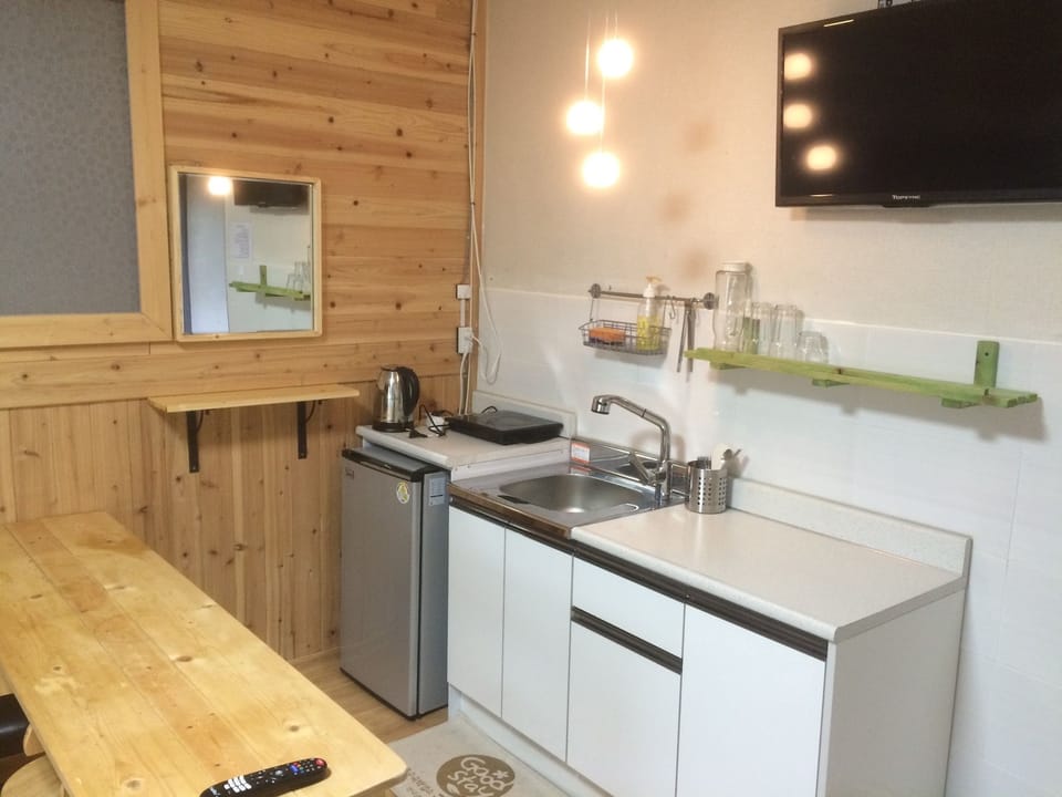 Family Triple Room | Private kitchenette | Mini-fridge