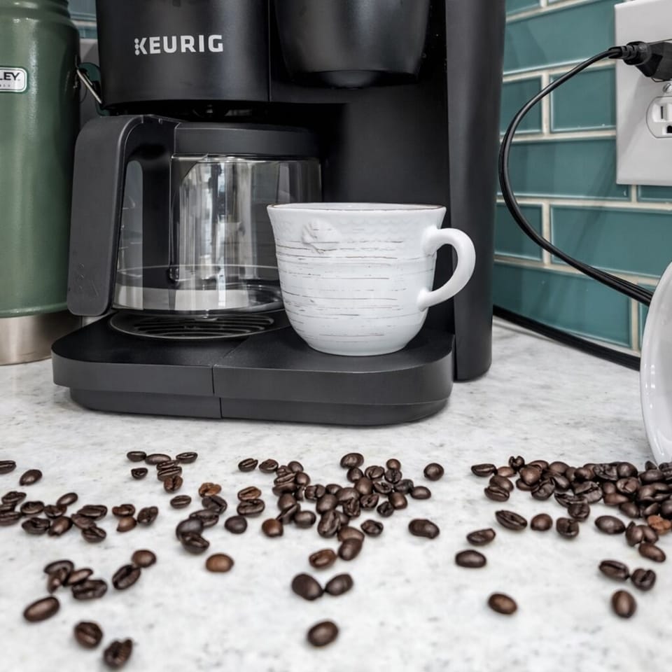 Kitchen: Brew morning coffee in style with modern appliances and fun decor!