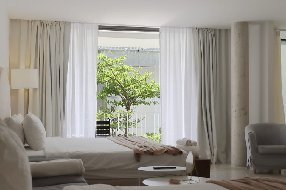 Sunray Deluxe for Four with Balcony | Minibar (free items), in-room safe, WiFi (free), individually decorated