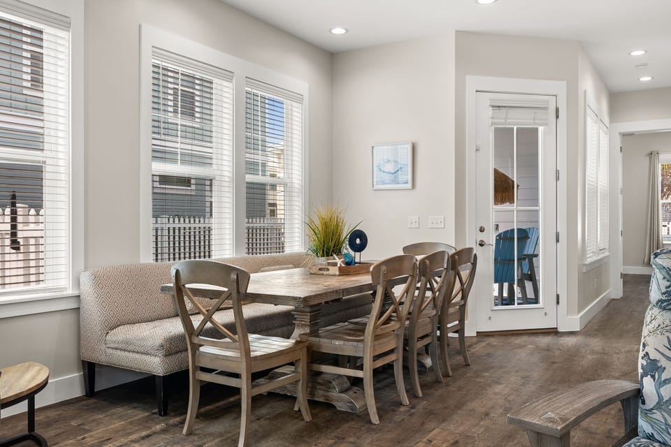 Dining space perfect for family dinners, game nights & memories after a day at the beach