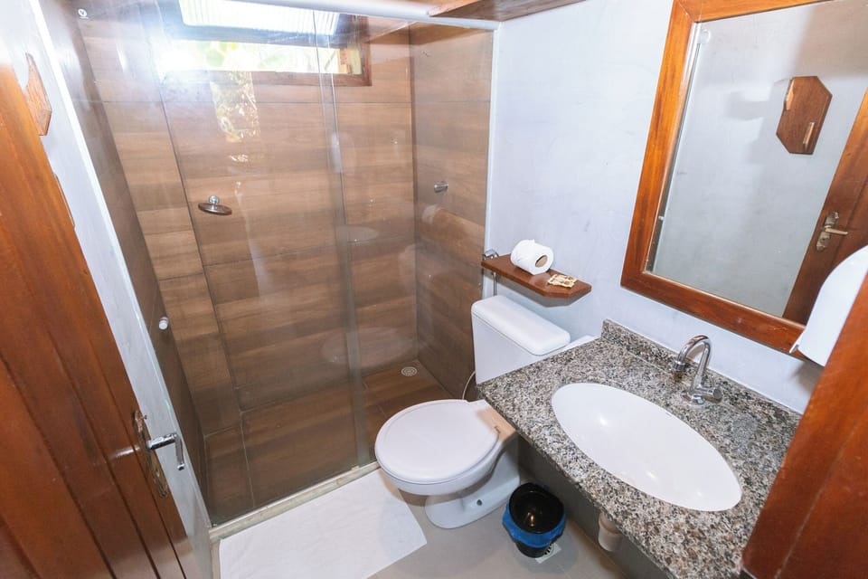 Shower, rainfall showerhead, towels, soap