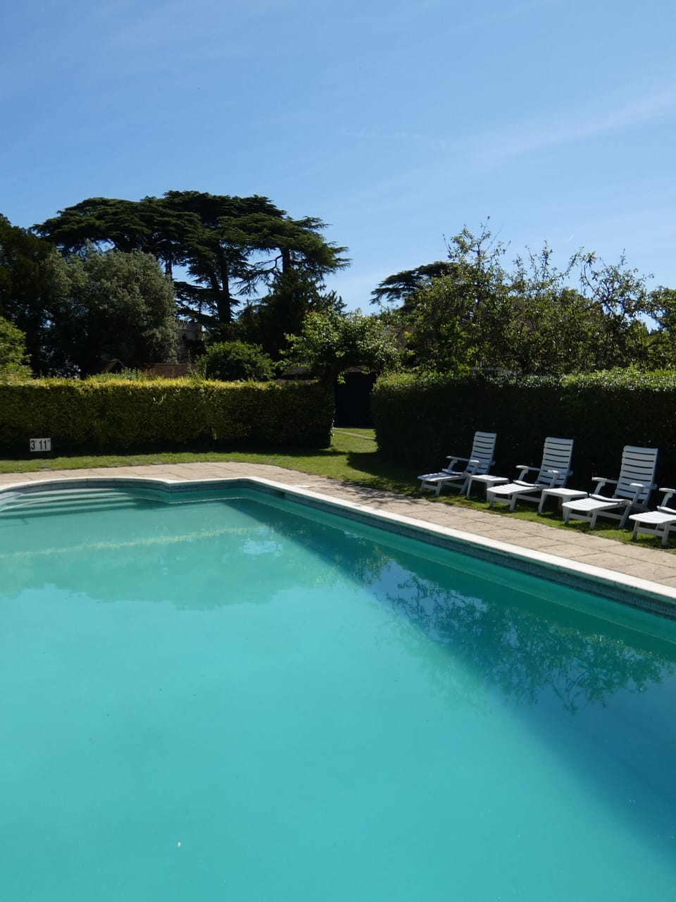 Outdoor Pool with Loungers