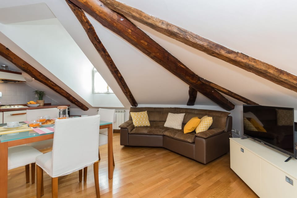 Loft, 1 Bedroom | Living area | 35-inch TV with digital channels