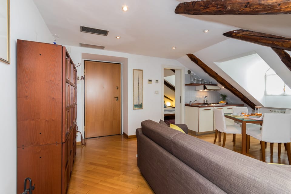Loft, 1 Bedroom | Living area | 35-inch TV with digital channels