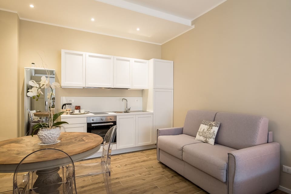 Apartment, 1 Bedroom | Living area | 35-inch flat-screen TV with digital channels, TV