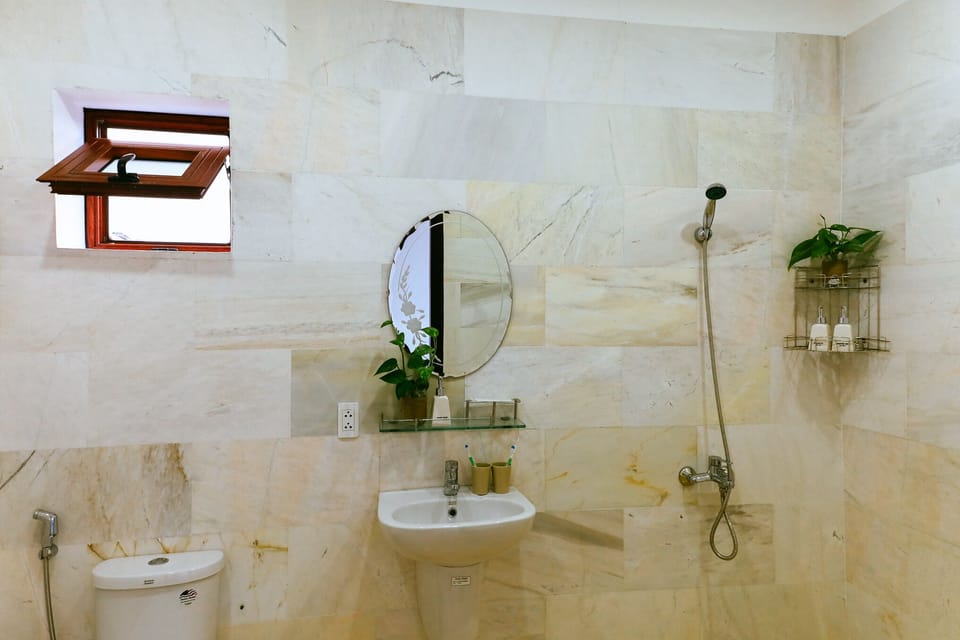 Family Room, 2 Bedrooms, Balcony | Bathroom | Shower, rainfall showerhead, hair dryer, slippers