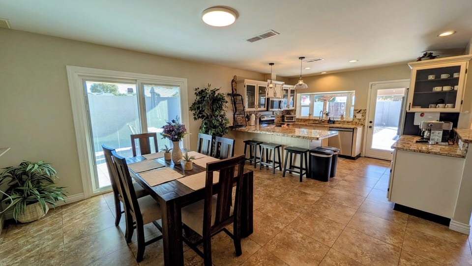 Access the courtyard and backyard through the slider or French door.