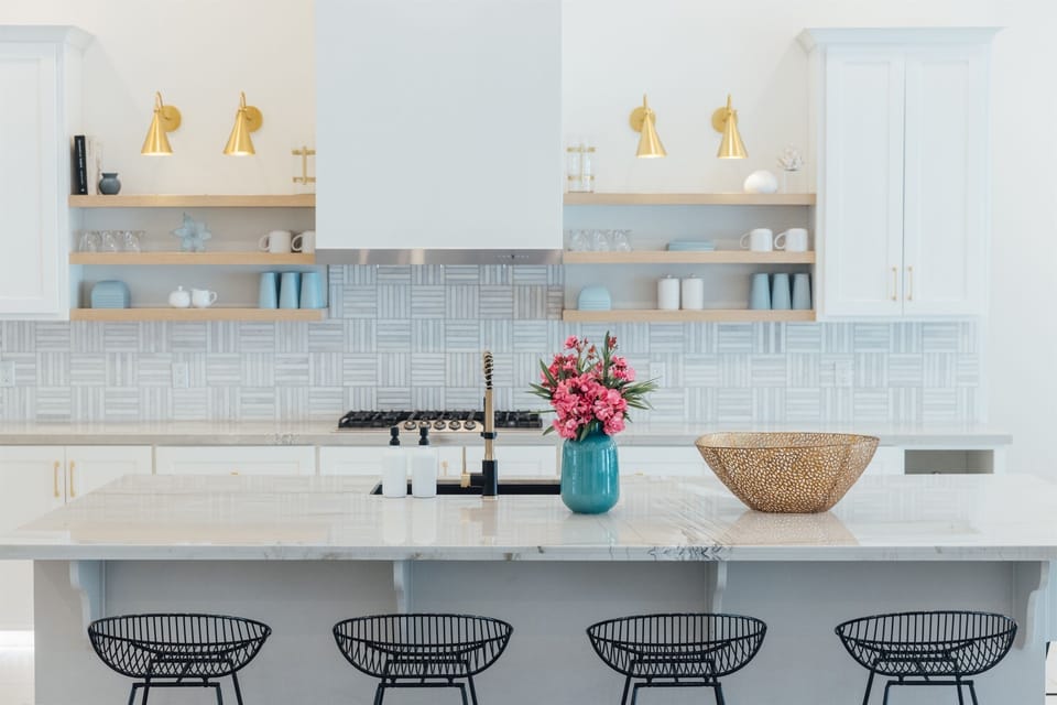 Counter stools overlooking the gorgeous kitchen