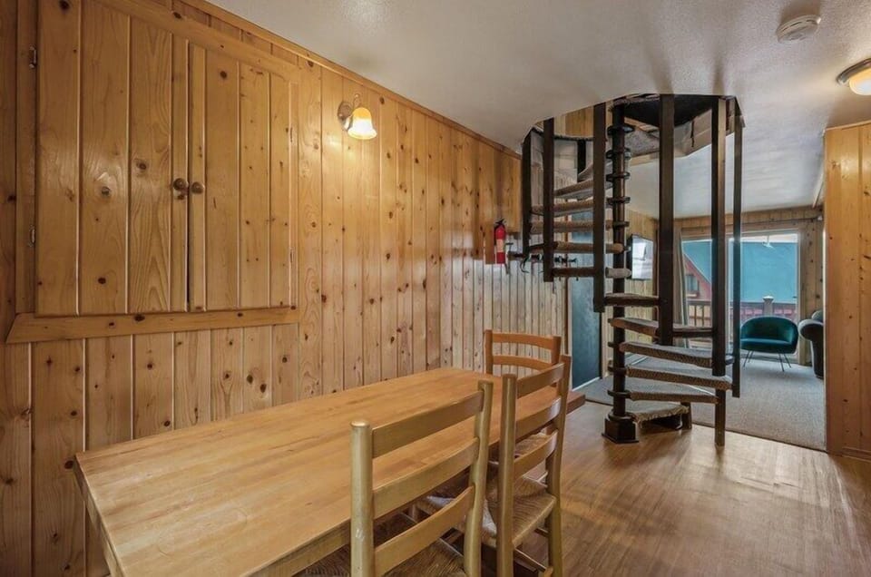 Full table that can seat 6 comfortably. Four chairs and a bench