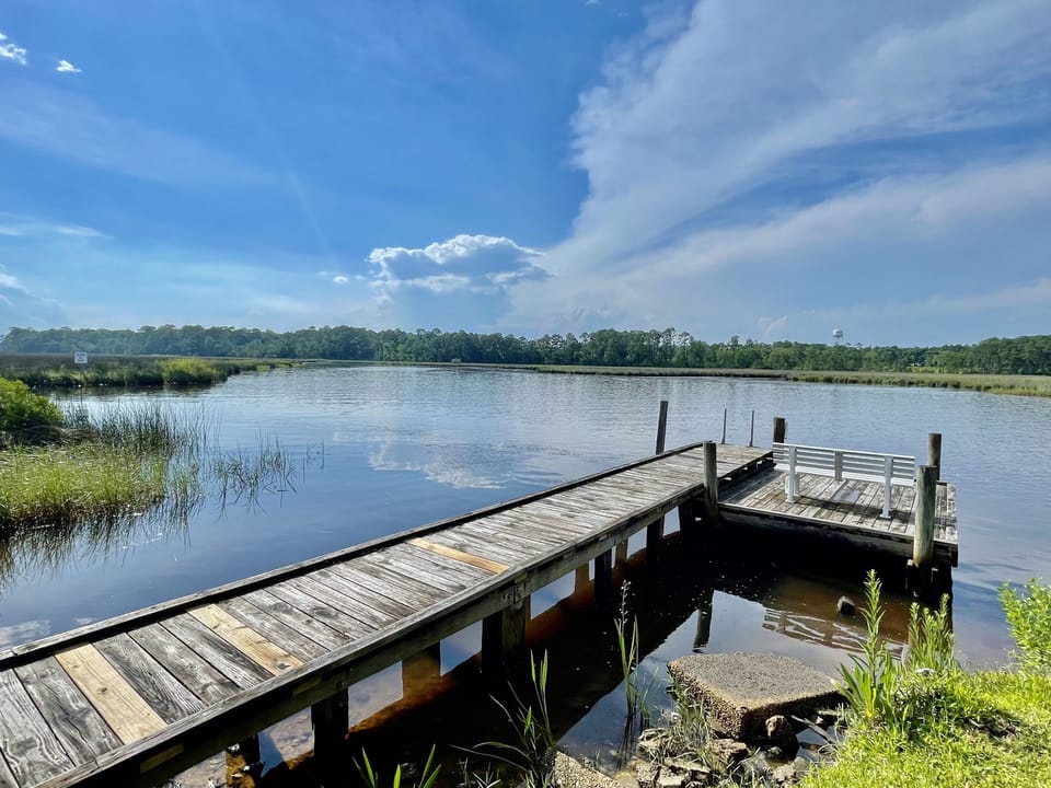 Nearby activities include fishing, boating, excursions to Ship Island, and more!