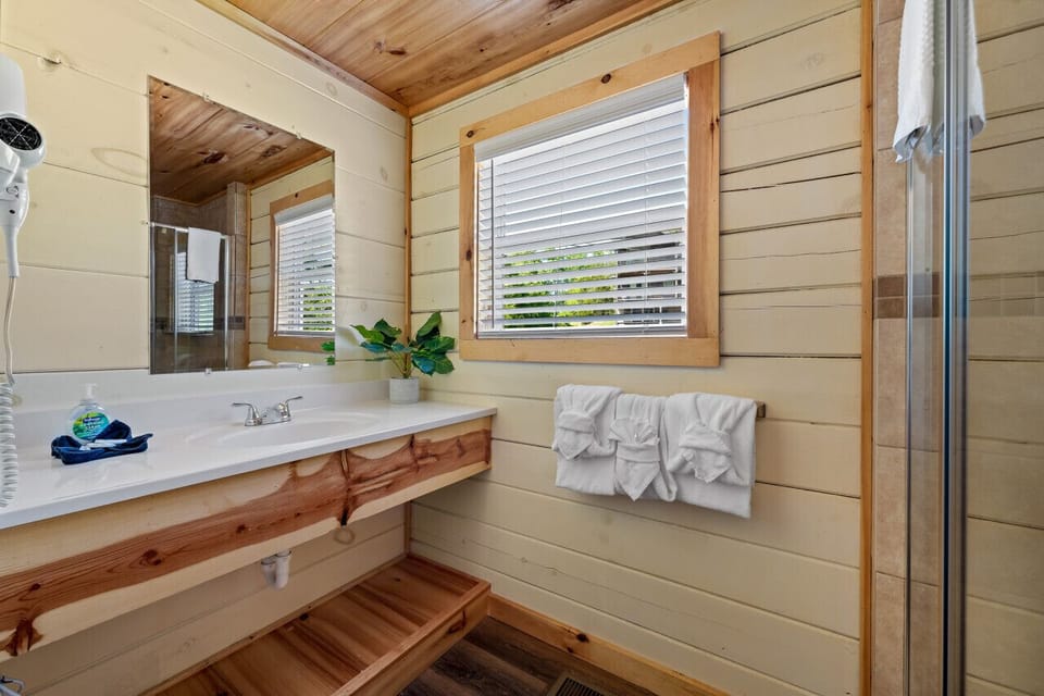 Bathroom 1: A clean, bright space to refresh and recharge for the day.