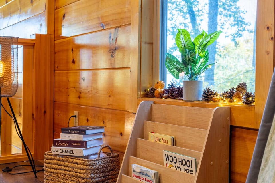 A book, a view, and a moment of peace – the simplest joys in the coziest corner.