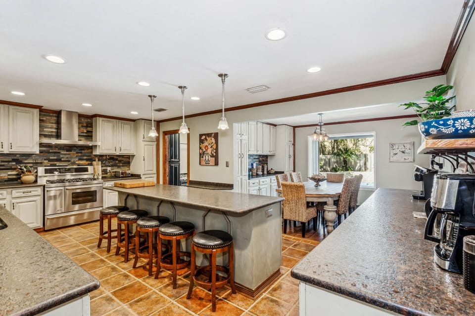 The custom gourmet kitchen really is the center of the home