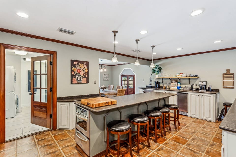 Additional bar seating on the huge kitchen island