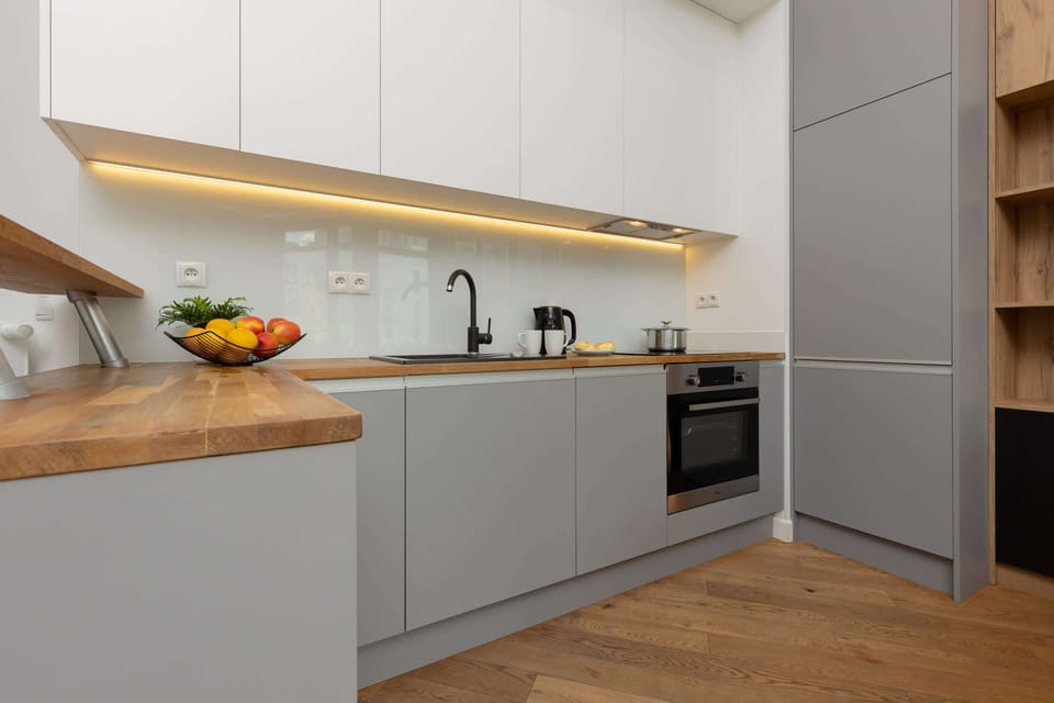 Cook and dine in style with the modern kitchenette and dining area.