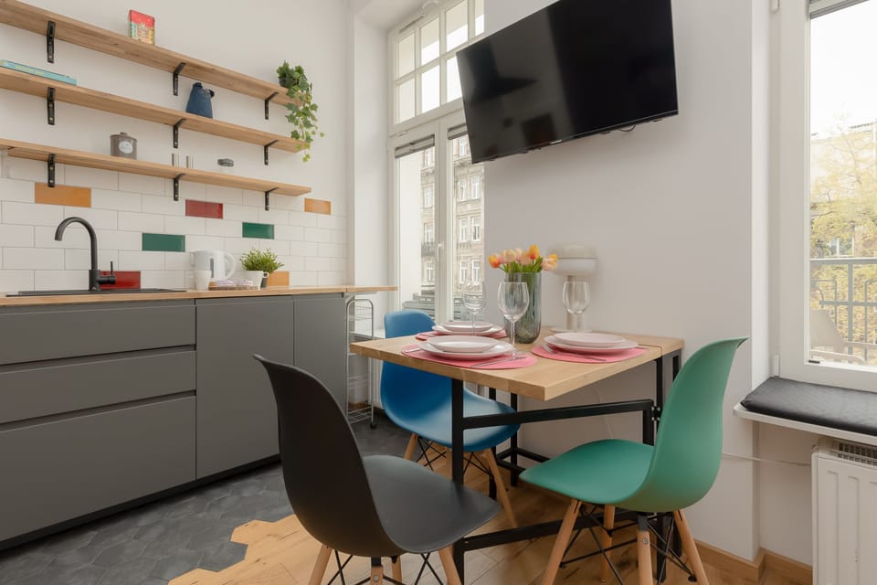 The living room's sleek design is both functional and aesthetically pleasing.