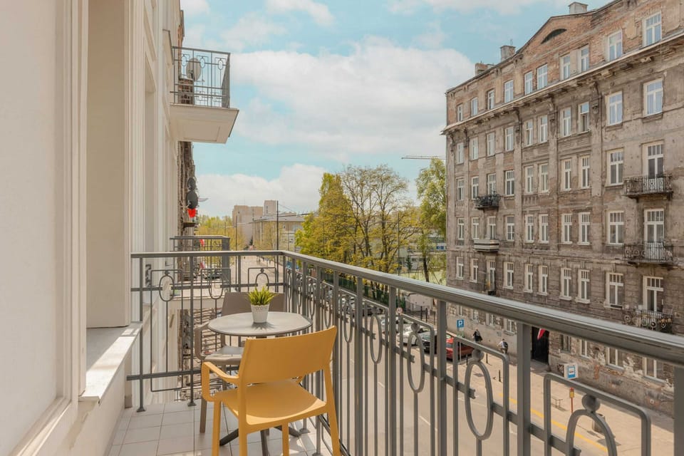The balcony provides a perfect spot for enjoying the fresh air. 