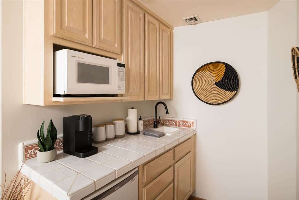Casita includes kitchenette with microwave, dishwasher, and coffee maker